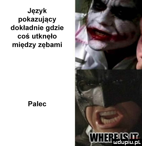 język pokazujący dokładnie gdzie coś utknęło między zębami palec